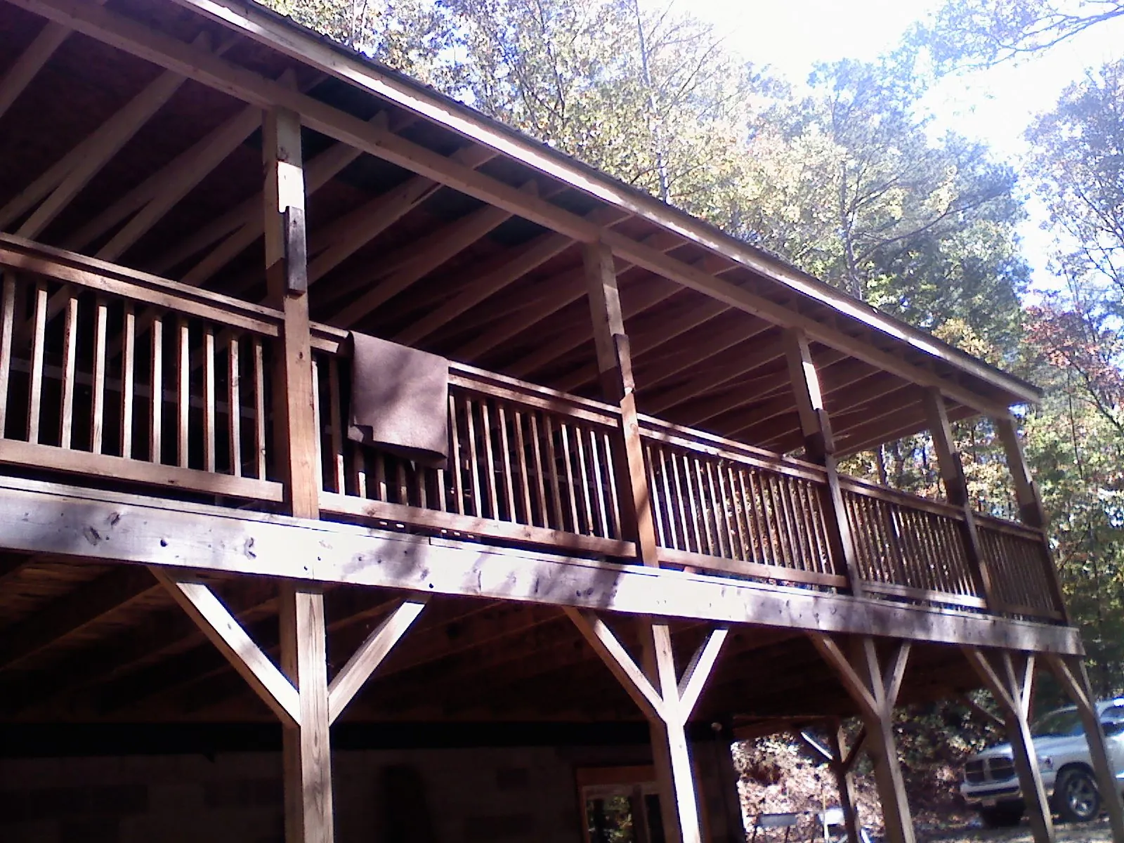 Timber framing under a new elevated porch and deck — Roof Leak Repair in West Park by Roofing Brothers